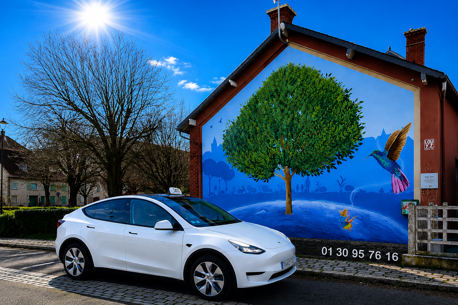 Taxi Tesla Model Y à Mézières sur Seine devant la fresque murale